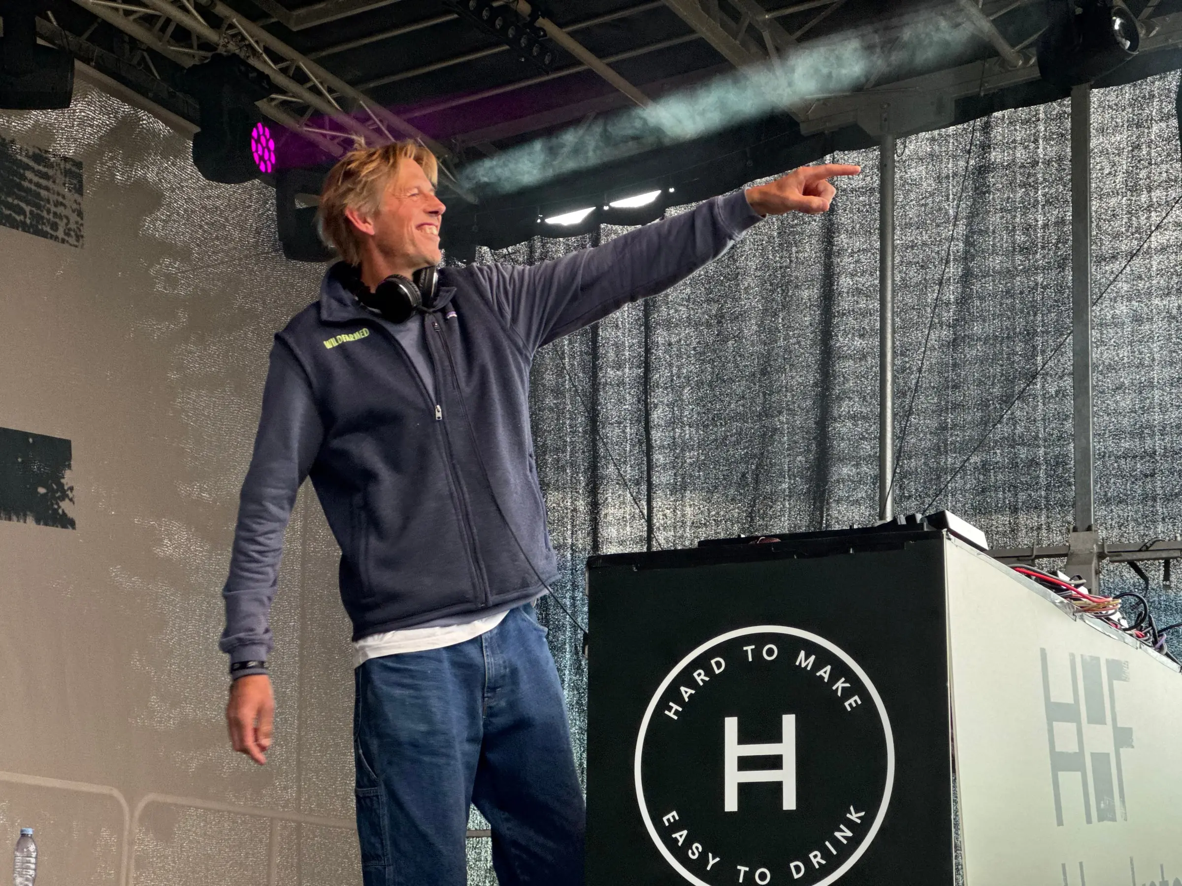 Andy Cato performing behind the Hawkstone-branded DJ booth