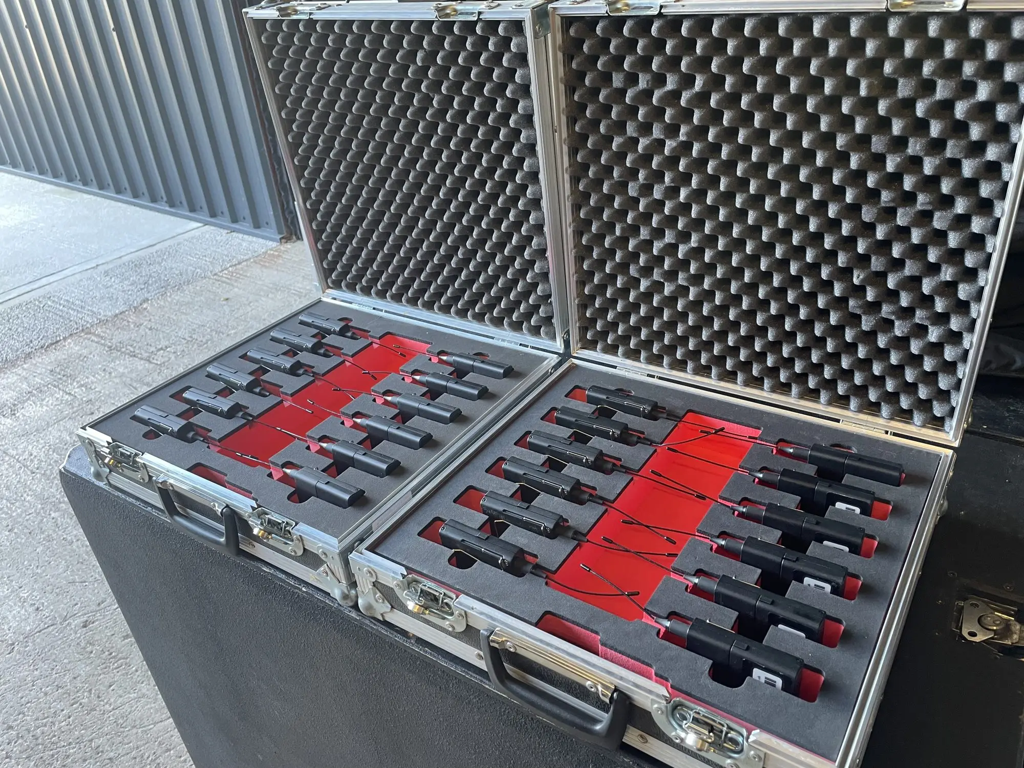 Case of Sennheiser beltpack transmitters