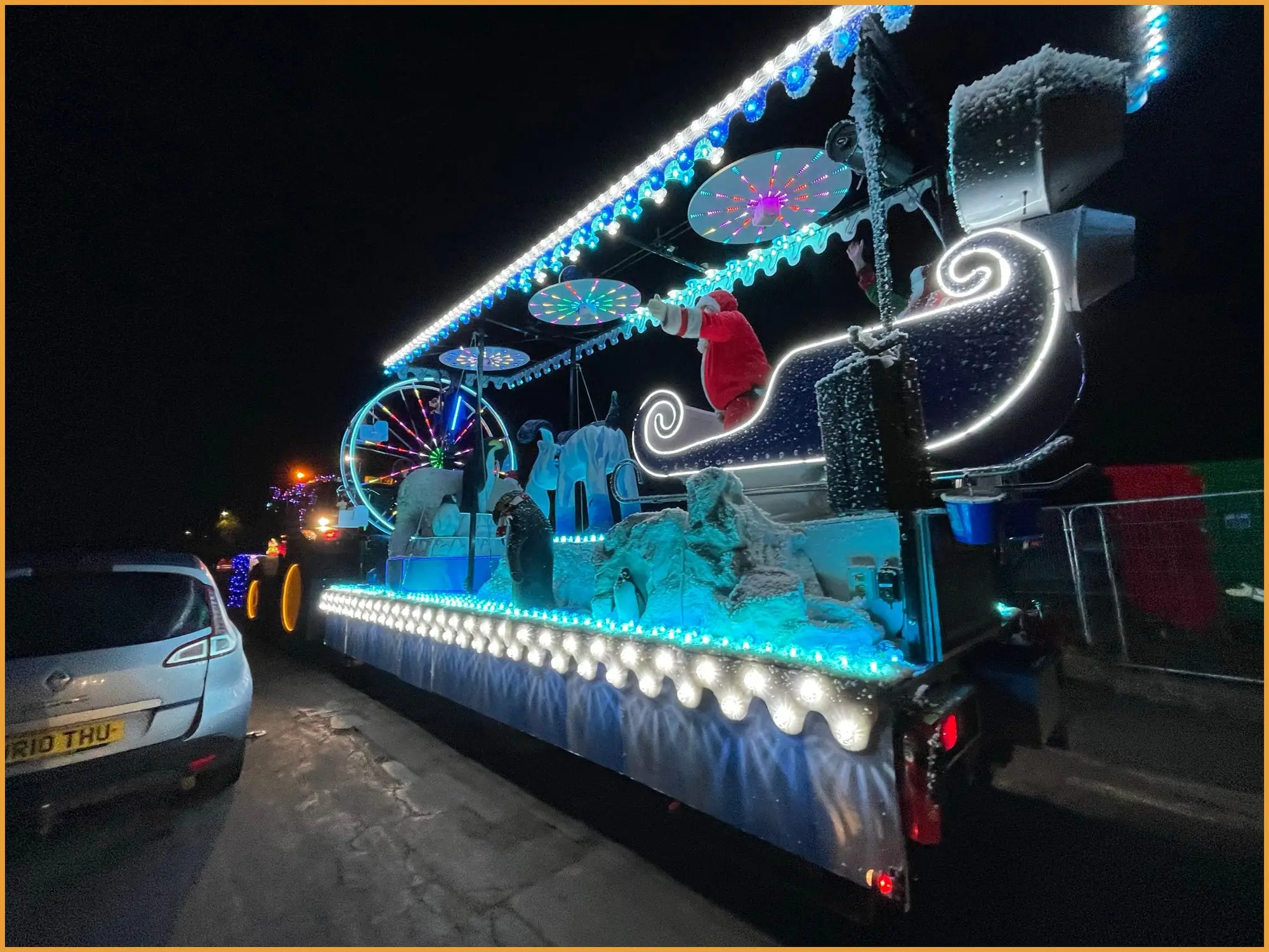 Side view of the decorated float with lights and speakers
