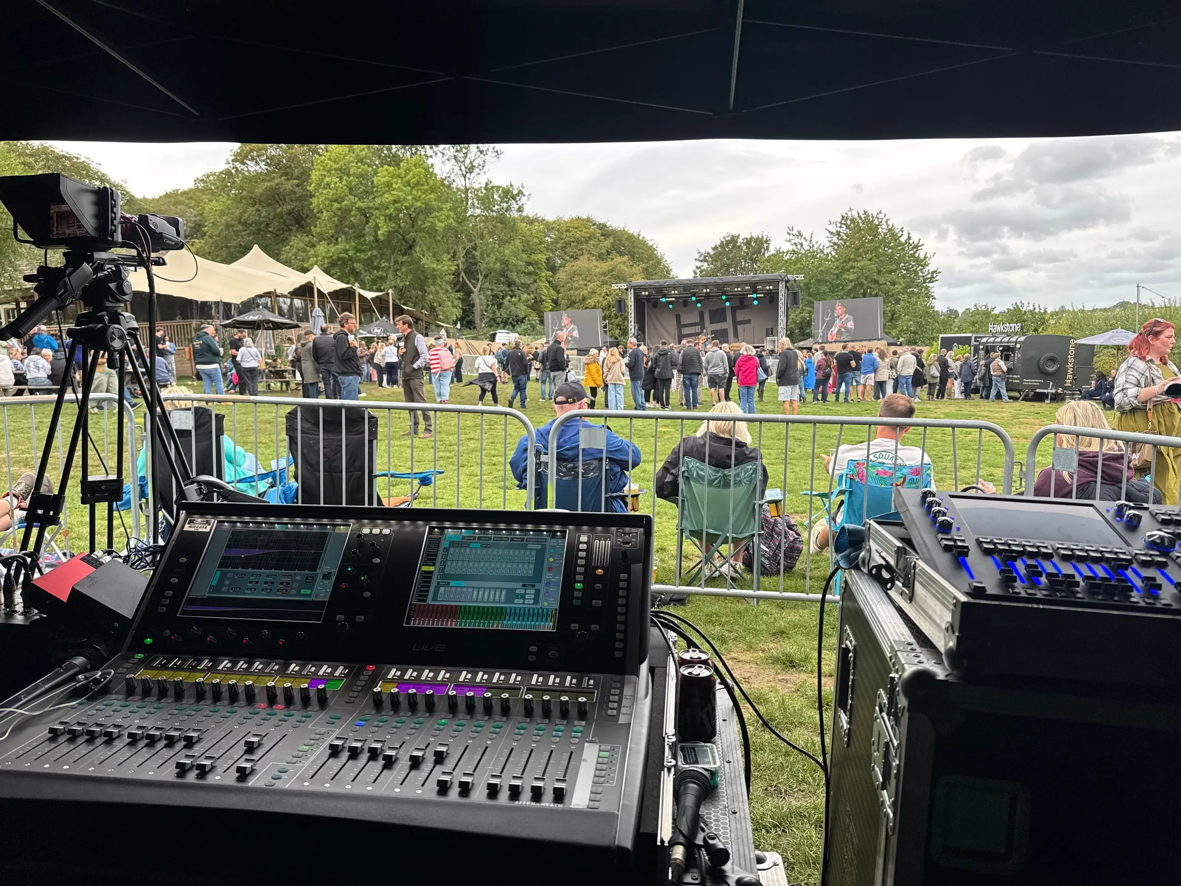 Front-of-house mixing console overlooking the event site and stage