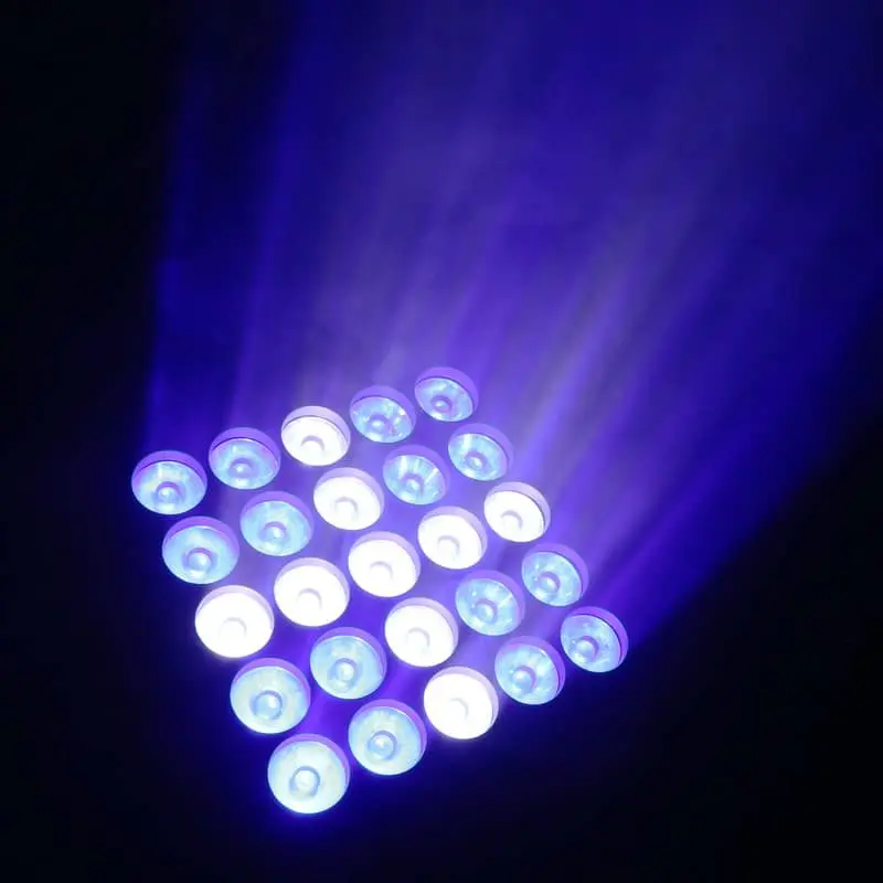 LED wash fixture glowing purple against a dark background