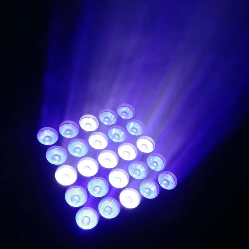 LED wash fixture glowing purple against a dark background